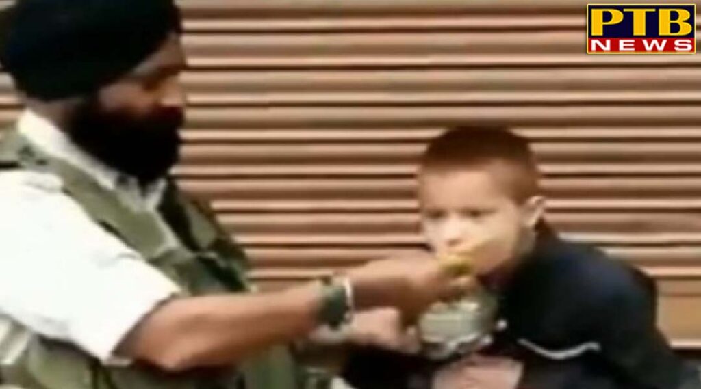 viral video jammu and kashmir crpf head constable feeds his lunch to differently abled boy
