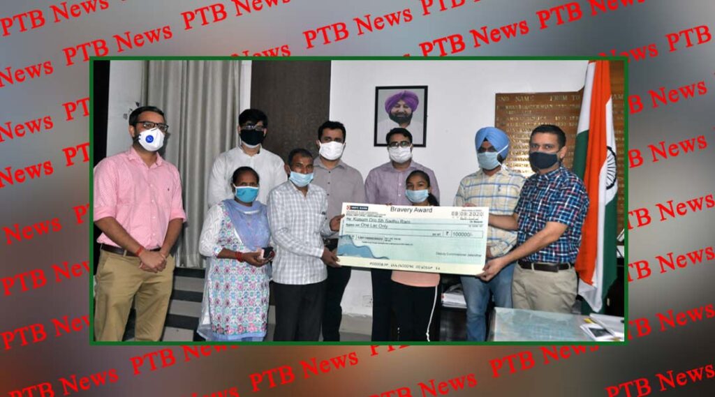 jalandhar dc ghanshyam thori hands over cheque of rs one lac to bravehart girl kusum Jalandhar PTB Big Breaking News