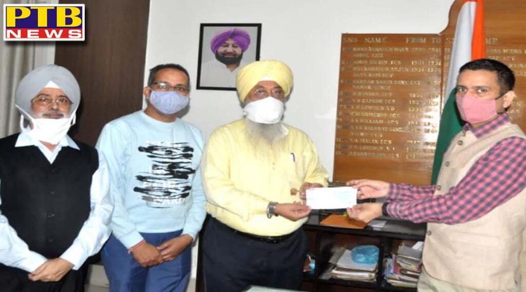 Dc Ghanshyam Thori hands over cheque of rs. 50,000 to Chanan Association running vocational training for intellectually retarded children Jalandhar