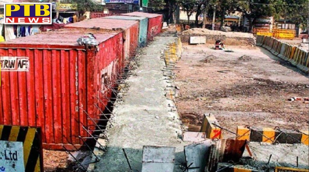 delhi nail that were fixed near barricades at ghazipur border are being removed ptb news big breaking
