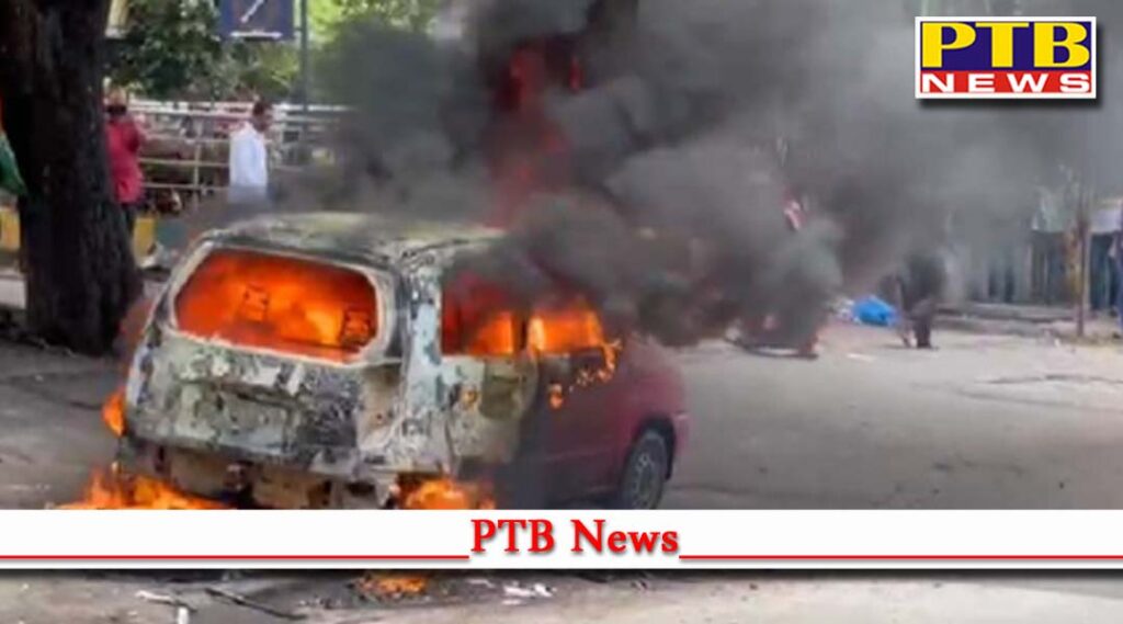 ed sonia gandhi questioning congress workers protest bengaluru burned colleague car