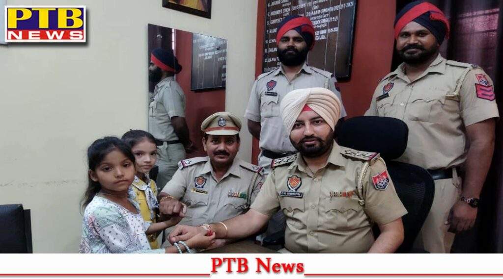 Two girls reached to tie rakhi to SHO Gagandeep Singh Shekhon posted at Bhargava Camp police station in Jalandhar