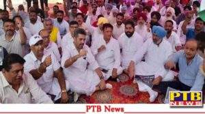 jalandhar congress leaders stage dharna demanding removal cabinet minister fauja singh sarari