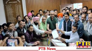 BJP leaders complain to the Election Officer against Minister Harbhajan Singh ETO and MLA Raman Arora for putting up posters against PM Modi