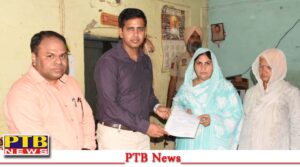 jalandhar-district-magistrate-himanshu-aggarwal-handed-over-ex-gratia-sanction-letter-of-rs-15-lakh-to-the-family-of-the-deceased-employee-during-the-lok-sabha-elections